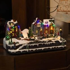 Animated Children Playing In Christmas Village With LED Light -Christmas Decor Shop alpine corporation christmas centerpieces wcc226mc 31 1000