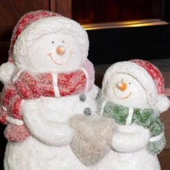 15 In. Tall Snow Friends Winter Snowman Family Statue 25 15 In. Tall Snow Friends Winter Snowman Family Statue -Christmas Decor Shop alpine corporation christmas figurines qwr908 fa 1000