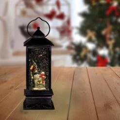 11 In. Tall Snowman Lantern Snow Globe With Warm White LED Light, Silver -Christmas Decor Shop alpine corporation christmas novelty lights qva126sl 31 1000