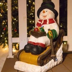 24 In. Tall Solar Snowman In Sleigh With LED Lights, Outdoor Festive Holiday Decor For Garden, Porch, Lawn 13 24 In. Tall Solar Snowman In Sleigh With LED Lights, Outdoor Festive Holiday Decor For Garden, Porch, Lawn -Christmas Decor Shop alpine corporation christmas novelty lights zen260slr s tm e1 1000