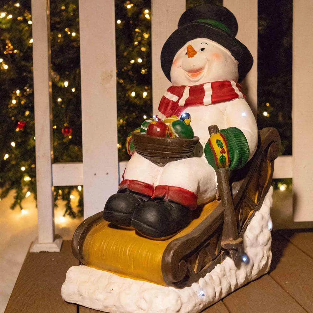 24 In. Tall Solar Snowman In Sleigh With LED Lights, Outdoor Festive Holiday Decor For Garden, Porch, Lawn 4 24 In. Tall Solar Snowman In Sleigh With LED Lights, Outdoor Festive Holiday Decor For Garden, Porch, Lawn - Image 2