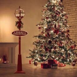 69 In. Christmas Snow Globe Lamp Post With Santa Scene, 2 Signs, Cascading Snow, And Christmas Carols -Christmas Decor Shop fraser hill farm christmas figurines fssl069a rd2 31 1000