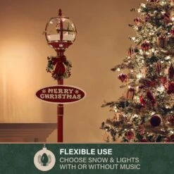 69 In. Christmas Snow Globe Lamp Post With Santa Scene, 2 Signs, Cascading Snow, And Christmas Carols -Christmas Decor Shop fraser hill farm christmas figurines fssl069a rd2 77 1000