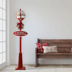 69 In. Christmas Snow Globe Lamp Post With Santa Scene, 2 Signs, Cascading Snow, And Christmas Carols -Christmas Decor Shop fraser hill farm christmas figurines fssl069a rd2 c3 1000