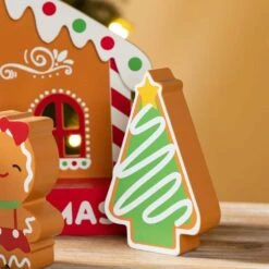 8.5 In. H Wooden Christmas Gingerbread House Table Decor (Set Of 4) -Christmas Decor Shop glitzhome christmas figurines 2009900064 fa 1000