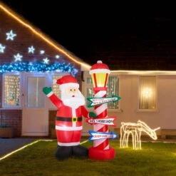 7.00 Ft. Lighted Inflatable Santa With Lamp Post Sign Decor -Christmas Decor Shop glitzhome christmas inflatables 2005200034 fa 1000