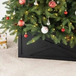 26 In. L Washed Black Wooden Tree Collar -Christmas Decor Shop glitzhome christmas tree collars 2010600072 44 1000