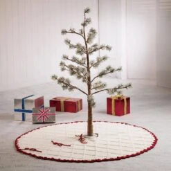 52 In. D Knitted Polyester White Christmas Tree Skirt With Red Trim And Pompom 19 52 In. D Knitted Polyester White Christmas Tree Skirt With Red Trim And Pompom -Christmas Decor Shop glitzhome christmas tree skirts 1113203194 31 1000