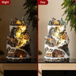 15.50 In. Lighted Skiing Moutain Resin Christmas Village With Movement And Music -Christmas Decor Shop glitzhome christmas villages 2040200001 76 1000