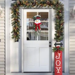 25 In. H Greenery Snowman Door Hanger -Christmas Decor Shop glitzhome christmas wall decorations 2010000039 77 1000