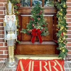 48 In. Gold And Silver Resin Christmas Nutcracker -Christmas Decor Shop haute decor christmas yard decorations dcgd0023 31 1000