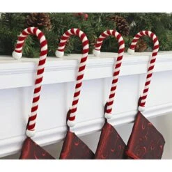 9 In. Steel Core Red And White Candy Cane Stocking Holder (4-Pack) -Christmas Decor Shop haute decor stocking holders cc0403 31 1000