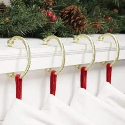3.1 In. Gold Metal Mantle Clip Chic Stocking Holder 4-pack -Christmas Decor Shop haute decor stocking holders mcc0400 31 1000