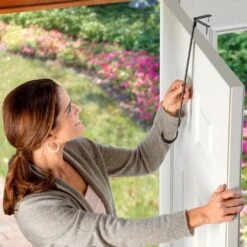 16.5 In. Artificial Matte Black Adapt Top And Bottom Adjusting Wreath Hanger -Christmas Decor Shop haute decor wreath hangers awh406 4f 1000