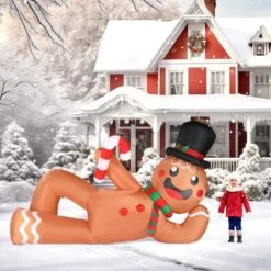 9.8 Ft. X 5.9 Ft. Pre-lit Lying Gingerbread Man Christmas Inflatable With Stakes -Christmas Decor Shop karl home christmas inflatables k1g61000242 1f 1000