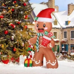 4.6 Ft.W X 7.9 Ft. H Pre-lit Gingerbread Man Christmas Inflatable With LED Lights 17 4.6 Ft.W X 7.9 Ft. H Pre-lit Gingerbread Man Christmas Inflatable With LED Lights -Christmas Decor Shop karl home christmas inflatables k1g61000249 44 1000