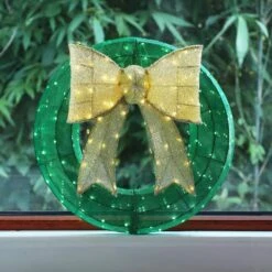 24 In. Green Pre-Lit LED Green Artificial Christmas Wreath With Gold Bow Holiday Decoration -Christmas Decor Shop karl home christmas wreaths k1g61000425 c3 1000