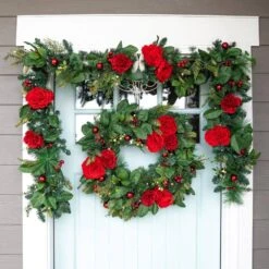 9 Ft. Pre-Lit LED Red Peonies And Berry Garland 9 9 Ft. Pre-Lit LED Red Peonies And Berry Garland -Christmas Decor Shop village lighting company christmas garland v 20705 4f 1000