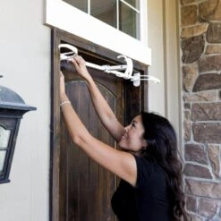 White Single Door Garland Hanger (for 34 In. Artificial - 52 In. Artificial Wide Doors) -Christmas Decor Shop village lighting company wreath hangers v 20720 wht 1f 1000